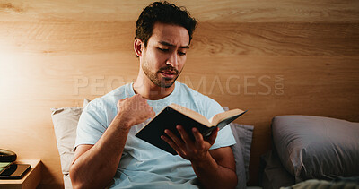 Buy stock photo Night, reading book and man in bedroom, relax and literature with entertainment. Evening, home or person with novel, reaction or cozy activity with knowledge, comfortable or fantasy with storytelling