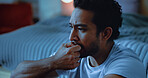 Night, nervous or man thinking with anxiety, mental health or insomnia from negative thought in bedroom. Late, sleepless or anxious person with depression, worry or biting nails from distress in home