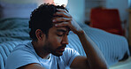 Night, upset and man thinking with depression, mental health or insomnia from sad memories in bedroom. Late, contemplation and anxious person with grief, worry and sleepless from stress in apartment.