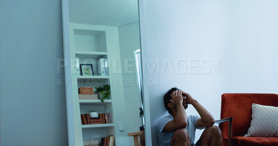Buy stock photo Stress, frustrated man and overwhelmed in house, poor mental health or anxiety for financial crisis. Bankruptcy, depressed or burnout person with debt worry, emotional breakdown or space for pressure