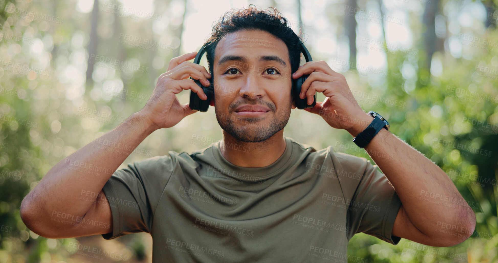 Buy stock photo Headphones, peace and fitness with man in nature for streaming service, meditation sound and calm. Workout playlist, wellness podcast and music with person outdoor for training audio and health