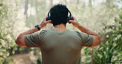Buy stock photo Headphones, back and fitness with man in nature for streaming service, meditation sound and calm. Workout playlist, wellness podcast and music with person outdoor for zen audio, radio and health