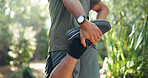 Man, hands and stretching with legs in forest for workout preparation, start or begin in nature. Closeup, male person or runner getting ready with warm up for fitness, outdoor training or exercise