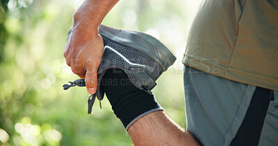 Buy stock photo Man, hands and stretching with legs in forest for workout preparation, start or begin in nature. Closeup, male person or runner getting ready with warm up in woods for outdoor training or exercise