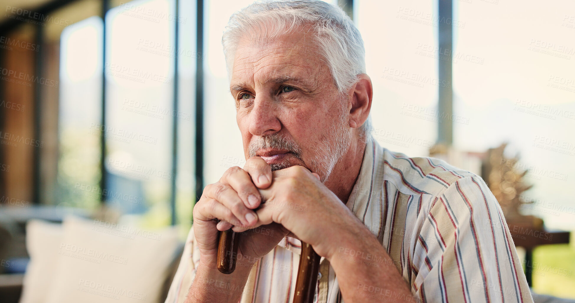 Buy stock photo Old man, walking stick and thinking on couch, memory and reflection in living room at retirement home. Elderly person with disability, cane and perspective in morning for rehabilitation with injury