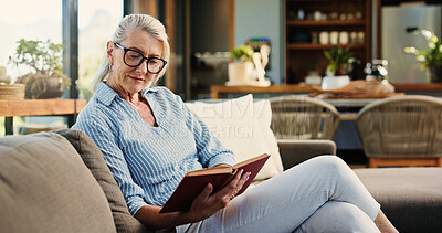 Buy stock photo Reading, book and senior woman in home with glasses, calm and literature insight on weekend rest. Free time, knowledge or mature person with specs, relax and information guide on Sunday afternoon.