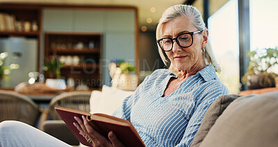 Buy stock photo Reading, book and senior woman on sofa with glasses, calm and literature hobby on weekend rest. Free time, peace and mature person in house with specs, relax and fantasy story on Sunday afternoon.
