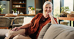 Portrait, senior woman and rest in home with smile, peace and calm morning on couch. Confident, elderly person and comfortable on sofa, weekend break and relax with happiness in lounge for retirement