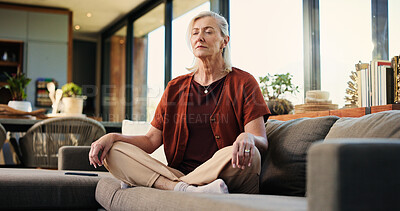 Buy stock photo Calm, woman and relax on couch with meditation for wellness, spiritual awareness and inner peace. Zen, mature person and mindfulness for stress relief, holistic health and tranquility in apartment.