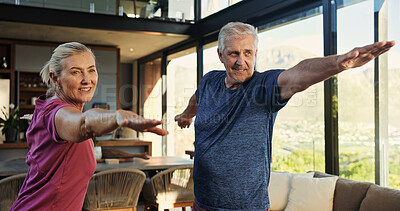 Buy stock photo Yoga, stretching and senior couple in home for exercise, health and wellness together on weekend. Happy, fitness and elderly man with woman in retirement for workout with warrior pose at house.