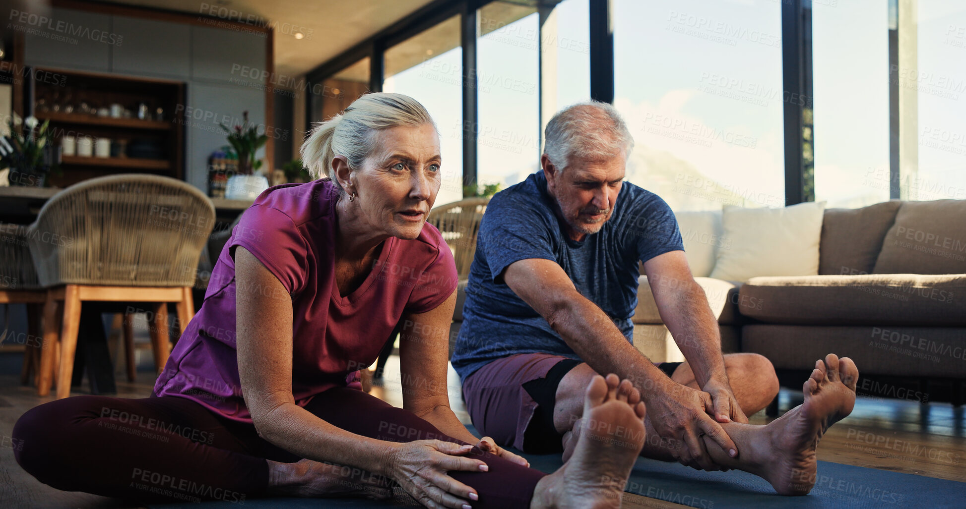 Buy stock photo Yoga, stretching or senior couple in home for wellness, mobility or flexibility activity for fitness. Retirement, morning routine or old people with exercise, challenge or pilates practice together