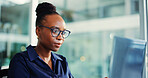 Office, laptop and woman with glasses, serious and risk assessment for investment proposal or online. Business, financial analyst and black person with tech for asset management, reading and research