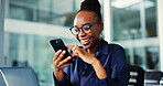 Phone, smile and black woman in office with message, communication or notification on mobile app. Cellphone, laptop and business person with networking, texting or social media on break in workplace