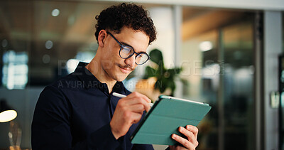 Buy stock photo Businessman, web designer and night with tablet for online website, design or development in office. Creative man, employee or working late with technology for schedule or planning in workplace