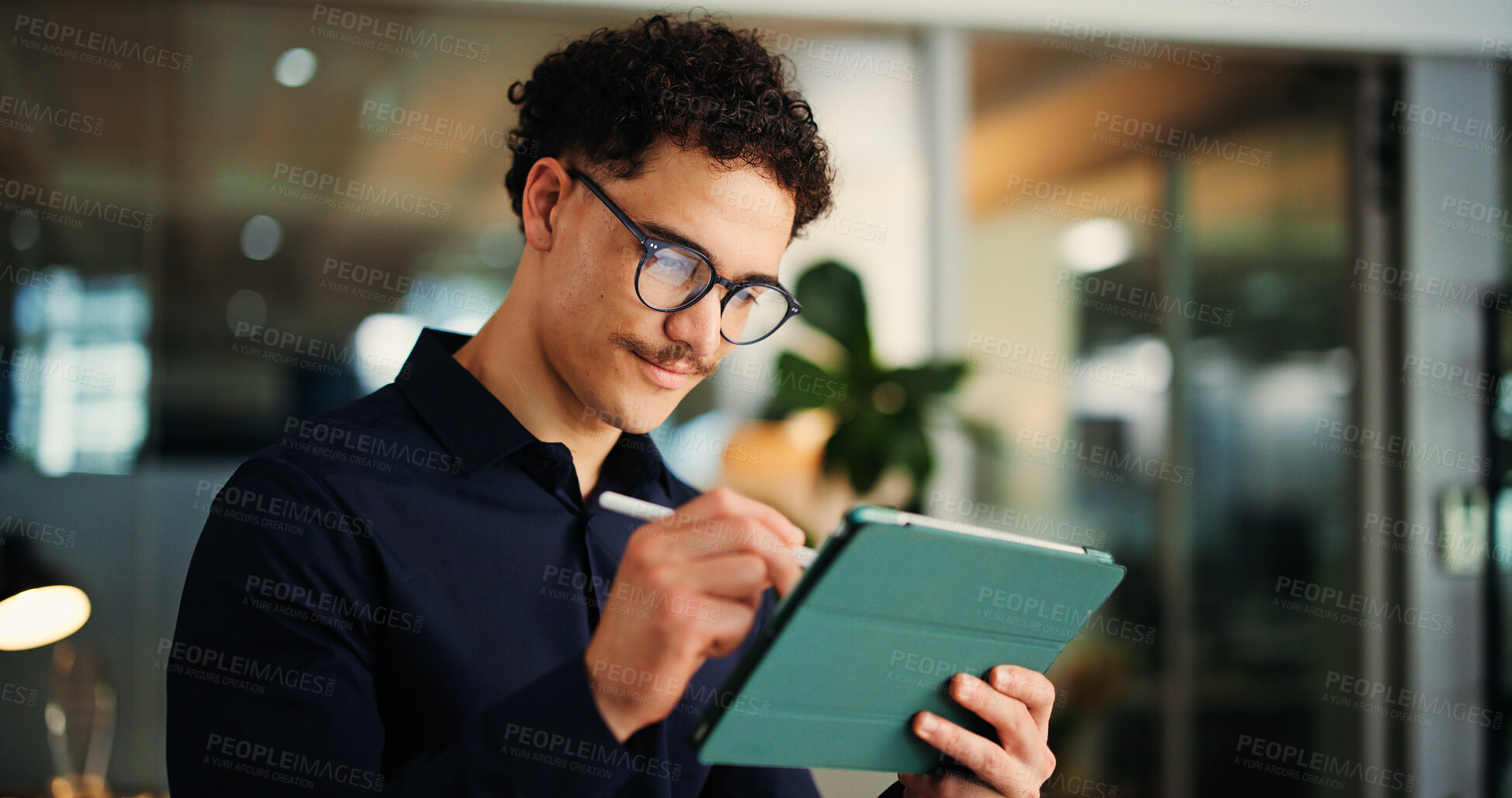 Buy stock photo Businessman, web designer and night with tablet for online website, design or development in office. Creative man, employee or working late with technology for schedule or planning in workplace