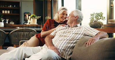 Buy stock photo Love, laugh or old couple on sofa with connection, romance or bonding together in retirement. Happy, elderly man or woman in house with embrace, marriage commitment or humor in romantic relationship.