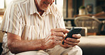 Old man, hands and scroll in home with phone for social media, text message or digital news update. Senior person, browse and search with tech in house for online communication, website and internet.