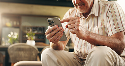 Buy stock photo Old man, hands and scroll in house with phone for social media, text message or digital news update. Senior person, browse and search with tech in home for online communication, website and internet.