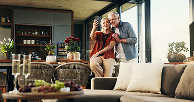 Buy stock photo Video call, senior or couple in house with phone, connection or online conversation in living room. Happy, mature man or woman with tech, digital communication or bonding together on virtual app.