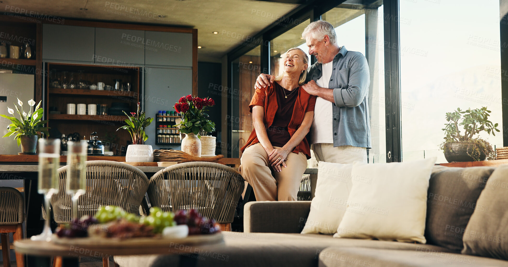 Buy stock photo Smile, senior couple and laughing at house with love, partner support and bonding together. Happy, elderly people and embrace for affection, funny joke and romantic with marriage commitment in lounge