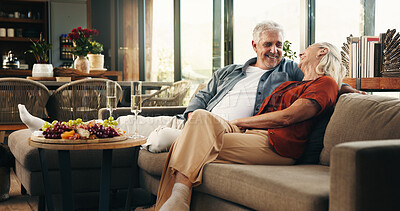 Buy stock photo Happy, senior couple and laughing at house with love, partner support and bonding together. Smile, elderly people and embrace for affection, funny joke and romantic with marriage commitment in lounge