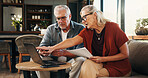 Elderly couple, laptop and document in home for financial planning, investment or paperwork for retirement. Senior man, woman and tech with budget for online banking, account or savings in house