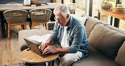 Buy stock photo Old man, reading and typing on sofa with laptop for asset management, retirement fund and prepare will. Senior person, browsing and email in house with computer, pension annuity and estate planning.