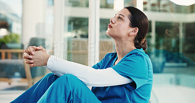 Buy stock photo Doctor, grief and woman in hospital, thinking and regret for operation failure, sad or mental health. Unhappy, surgeon and person with depression for loss, reflection and guilt for medical error