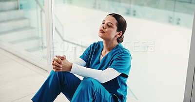 Buy stock photo Doctor, guilt and woman in hospital, thinking and regret for operation failure, sad or mental health. Clinic, surgeon and person with depression for loss, disappointed or reflection for medical error