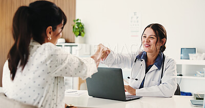 Buy stock photo Women, handshake and doctor with patient, hospital and happy for medical appointment or consultation. Clinic, greeting and shaking hands with healthcare worker and people with laptop for diagnosis