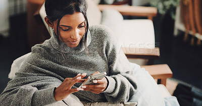 Buy stock photo Phone, reading and relax with woman in home for social media, communication and online forum. Contact, networking app and digital chat platform with person and mobile in living room of apartment