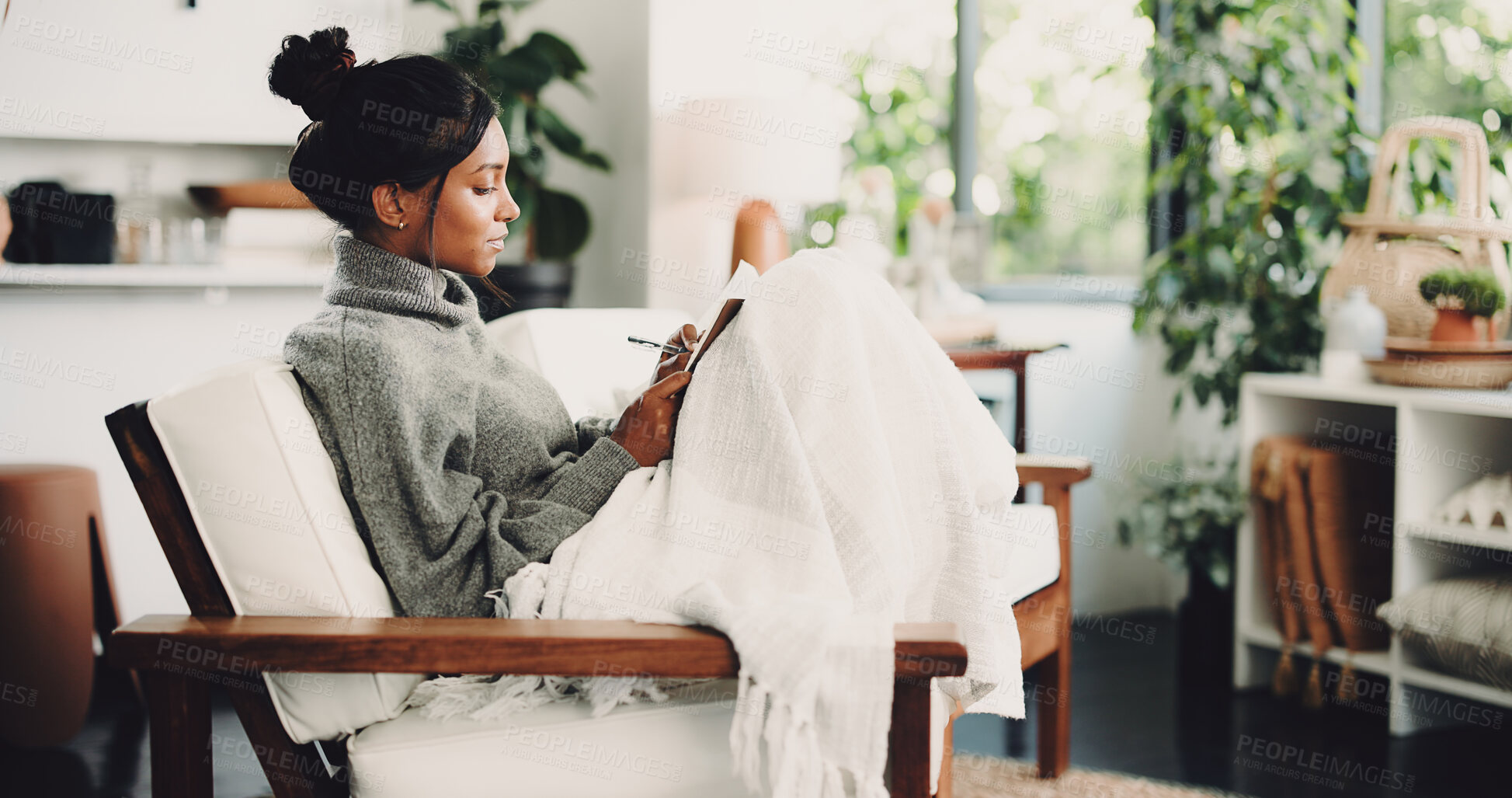 Buy stock photo Relax, notebook and writing with woman on sofa for inspiration, journal prompt and reminder. Reflection, agenda and planning with person in living room of home for diary, checklist and brainstorming