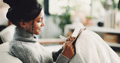 Buy stock photo Smile, notebook and writing with woman on sofa for inspiration, journal prompt and reminder. Reflection, agenda and planning with person in living room of home for diary, checklist and brainstorming