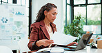 Laptop, office and business woman with documents for financial review, statistics or budget report. Corporate, planning and person on computer with graphs, paperwork and research for finance analysis