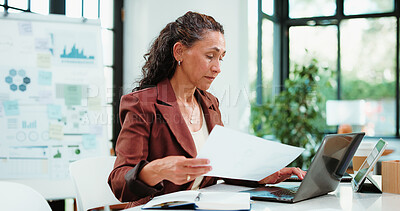 Buy stock photo Laptop, office and business woman with documents for financial review, statistics or budget report. Corporate, planning and person on computer with graphs, paperwork and research for finance analysis
