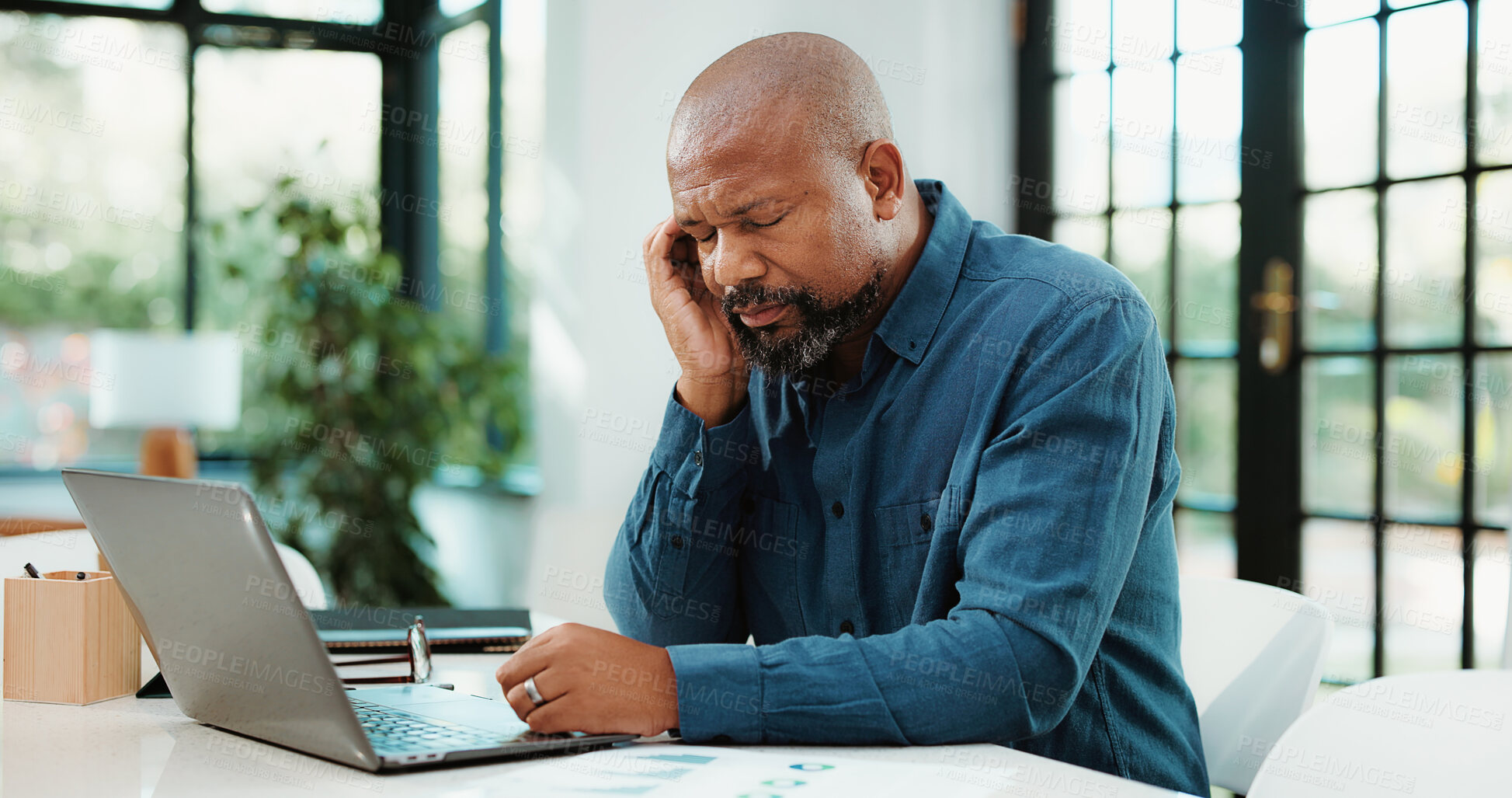 Buy stock photo Fatigue, headache and black man in office with laptop for mistake, error or failure on finance report. Computer, migraine and African financial manager with stress for investment deal in workplace.