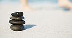 Balance, peace and travel with stones on beach for holistic wellness, environment and feng shui. Tranquility, mindfulness and zen energy and elements with rocks outdoor for nature, pillar and space