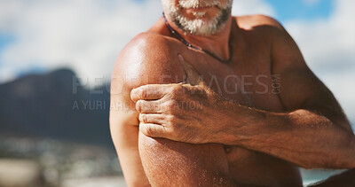 Buy stock photo Hand, shoulder pain and man in nature with tension, inflammation or stiff joint with fibromyalgia. Mature male person, topless with pressure or spasm of muscle ache, injury or body burnout outdoor