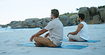 Zen, people and yoga at beach with meditation, reflection and peaceful moment for spiritual awareness. Calm, men and wellness at ocean with mindfulness, chakra alignment or relax for holistic health.