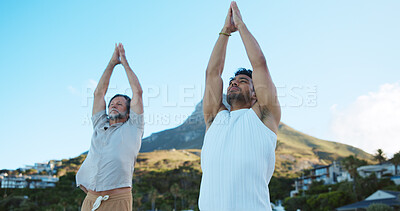 Buy stock photo Beach, stretching and men with fitness, hands together and nature with breathing, calm and instructor. Personal trainer, outdoor and people with routine, hobby and wellness with exercise and support