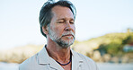 Mature man, breathing and yoga outdoor with meditation, spiritual healing and mindfulness. Male person, reiki and fitness for wellness, holistic balance and inhale exercise for inner peace at beach