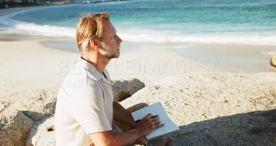 Buy stock photo Mature man, thinking and beach with book for fresh start, new beginning or checklist in nature. Thoughtful, male person or contemplating with diary or notebook on ocean coast for outdoor to do list