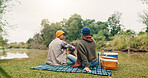 Back, camping and couple in forest, picnic and bonding together for anniversary celebration. Love, man and woman in woods, relax and romance with relationship, nature and adventure with food and talk