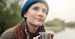Camping, thinking and woman with coffee, relax and morning with contemplation. Winter, espresso and person in forest, cosy and caffeine to start day, sustainable travel and adventure with reflection