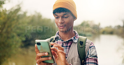 Buy stock photo Phone, happy and man in nature for backpacking with online maps for directions on hike trail. Smile, technology and male person with cellphone for trekking tips on blog on mobile app in forest.