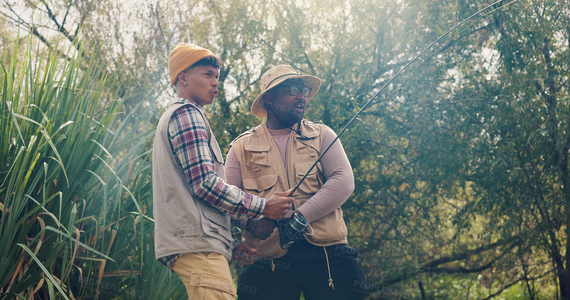 Buy stock photo Men, friends and rod for fishing outdoor with instructions, casting technique and adventure. People, helping and fisherman with equipment in nature, reel guidance and weekend hobby for vacation trip