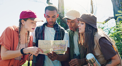 Buy stock photo Hiking, map and reading with friends in nature for travel check, adventure and location. Tracking, vacation and explore with group of people outdoor for trekking, wilderness and eco holiday guide