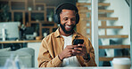 Headphones, smile or black man with phone in office, music listening or motivational podcast for work boost. Mobile, notification or person with audio app for streaming, workplace playlist or happy