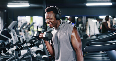 Buy stock photo Dumbbell, fitness and headphones with happy man in gym for bodybuilding, strength training or workout routine. Exercise, music and weights with bodybuilder in health club for physical challenge