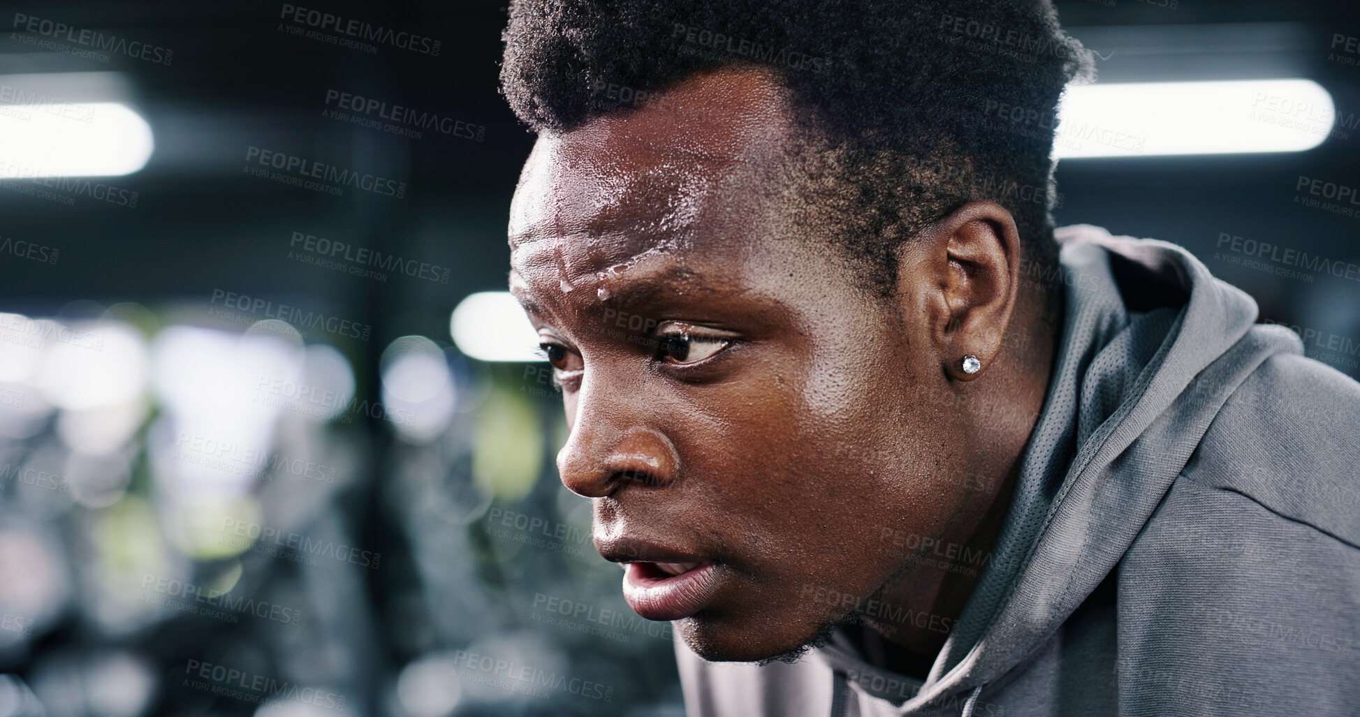 Buy stock photo Break, tired and black man in gym for fitness, wellness and recovery from intense exercise. Sweat, fatigue and person in workout club for resting, health and breathing for challenge with bokeh